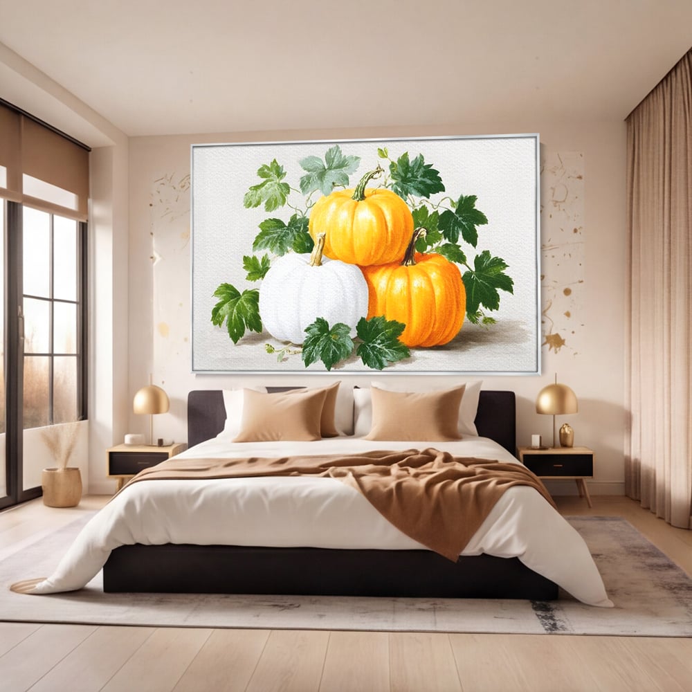 Tablou canvas cu pictura decorativa cu trei dovleci, in rama de aluminiu argintiu, pe perete intr-un dormitor